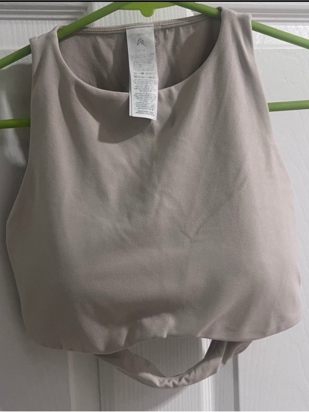 Oner Active Women’s sports Bra with padding inserts. Beige size M